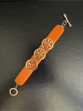 Tory Burch Orange Leather Bracelet with Gold Logo Medallions